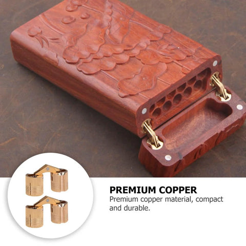 Front view of a carved wooden jewelry box with 2 copper hidden bracket hinges; recessed hardware.
