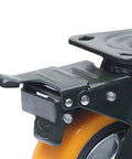 Close-up of heavy duty caster wheel with top plate swivel and brake showing puncture resistant polyurethane for furniture workbenches and carts.