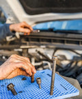 Original Blue Fastener Organizer Tray Pro Grade For Mechanics And DIYers Silicone Bolt And Screw Tray in use during car maintenance