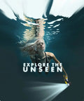 Woman diving underwater holding DiveRig4 Underwater Rig Bundle With Waterproof LED Light For GoPro, light illuminating path
