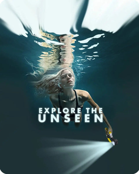 Woman diving underwater holding DiveRig4 Underwater Rig Bundle With Waterproof LED Light For GoPro, light illuminating path