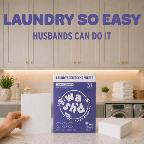 Heavy Duty Laundry Detergent Sheets Featuring 3x Stain Fighting Enzymes on kitchen counter with towels and washer.