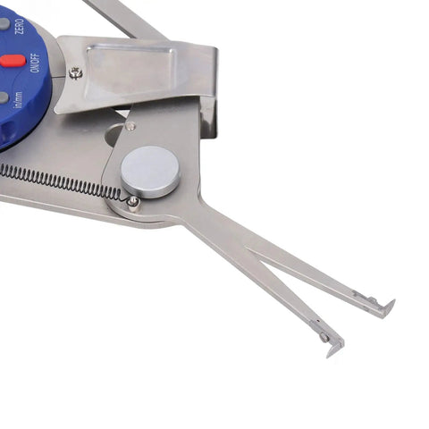 Close-up of Horett Digital Dial Caliper 8 to 28mm Hole and Groove Depth Gauge showing steel measurement arms and LCD controls.