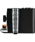 Step Up Your Home Brew Game With This Compact Automatic Coffee Machine Featuring A Pro Aroma Grinder And Super Simple Programmable Settings In Classic Metropolitan Black Color, side view showcasing the sleek design and espresso shot.
