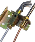 Close-up of water heater pilot assembly with thermocouple and natural gas copper tubing mounted on metal bracket