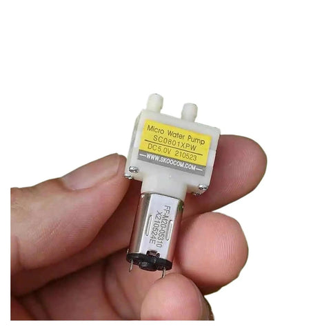 Straight Up Water Tank Pump Motor Swap Out For Robotic Vacuum Cleaners Built Tough With Rock Solid Suction Smooth Airflow Circulation Heavy Duty Upgrade Accessory That Fits Like A Glove. Micro water pump in hand.