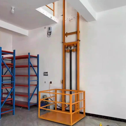 Smooth Operator Electric Lifting Platform And Wall Mounted Freight Elevator With Wireless Remote in warehouse setting.