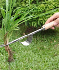 Back-Saving Garden Weeding Tool With Wood Handle And Stainless Steel Forks used to pull grass root from lawn