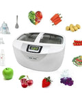 Slick 2.5L Digital Ultrasonic Cleaner With 40Khz Power And Digital Timer surrounded by fruits and vegetables, showcasing its cleaning versatility.