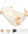 Cream baby swing with wooden bars, adjustable tree design, 5-point safety belt, for indoor and outdoor use, porch garden backyard.