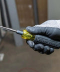 6 In 1 Tapping Tool From Klein Tools With Cushion Grip for repairing and cleaning threads shown held by gloved hand