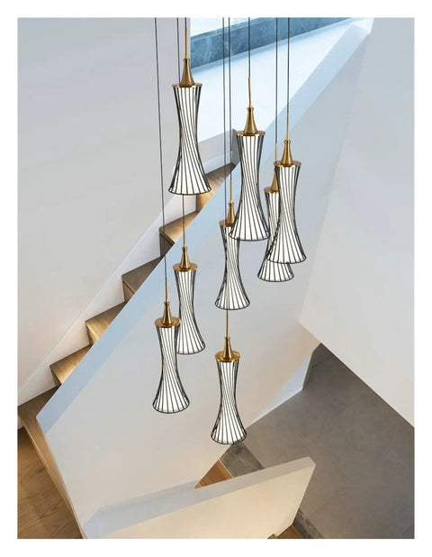 Modern Black Creative Pendant Lamp Pretty Waist LED Light for Duplex Living Room Staircase Loft Restaurant (Colour: 1Light Size: Neutrallight4000K) (8lights Neutrallight4000K) hanging above a staircase.