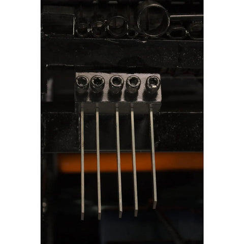 Close-up of WRA40R Automatic Electric Wire Stripping Stripper, showing five-wire output setup, dual size cutting slots visible.