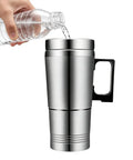 Zero Drama 12V And 24V Ride Along Electric Kettle pouring water into stainless steel travel mug with handle.