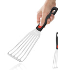 Hand-held stainless steel fish spatula with black handle and red grip, 10.3-inch, slotted.