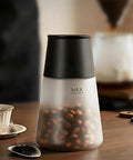 Smart Vacuum Coffee Canister For Beans Nuts And Tea 650 Ml airtight storage jar with black lid and borosilicate design.