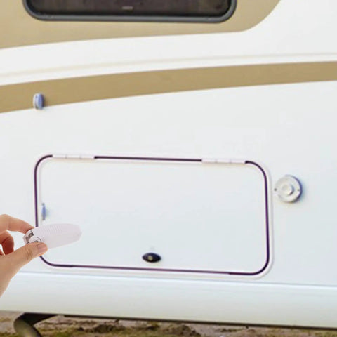 Person holding a Must-Have White Stainless Steel And Abs Baggage Door Catch Clip For Rv Trailer Camper, ready to secure storage.