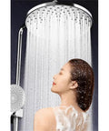 Surface Mount Bathroom Faucet With Handheld Shower 304 Stainless Steel Hot And Cold Mixer Install Without Tools Silicone Anti Clog Pores For Kids Pets Copper Core Top Shelf Quality showerhead with water cascading over a user in a modern bathroom.