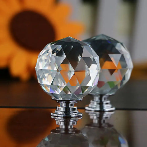 No Hassle Premium Clear Glass Crystal Cabinet Knobs 8 Pack Round Drawer Pulls With Slick Mirror Shine Including Three Mounting Screws For Quick Home Decor Refresh Project, close-up of round crystal cabinet knobs.