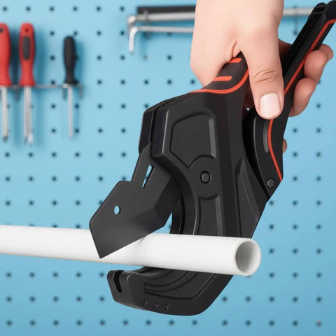 Ratcheting Tube Cutter For PVC Tubing Beastly Heavy Duty Aluminum Pipe Shear being used on white plastic pipe