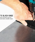 Person installing Heavy Duty Metal Piano Hinge Set With Screws For Wood Cabinet Doors And Pianos, Wear Resistant Black Iron, 11.79x1.18x0.31 in
