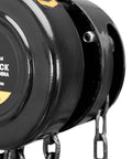 Close-up of manual chain block hoist 1 ton capacity with 2 heavy duty hooks steel hand lift 8 ft lift black oxide chains.