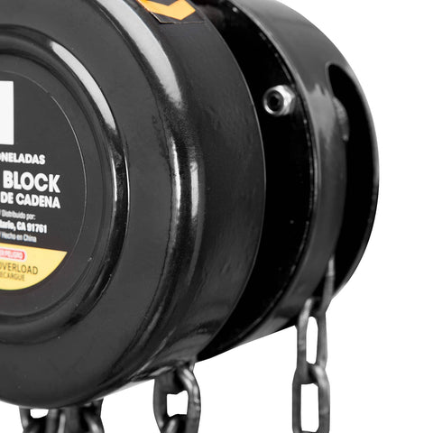 Close-up of manual chain block hoist 1 ton capacity with 2 heavy duty hooks steel hand lift 8 ft lift black oxide chains.