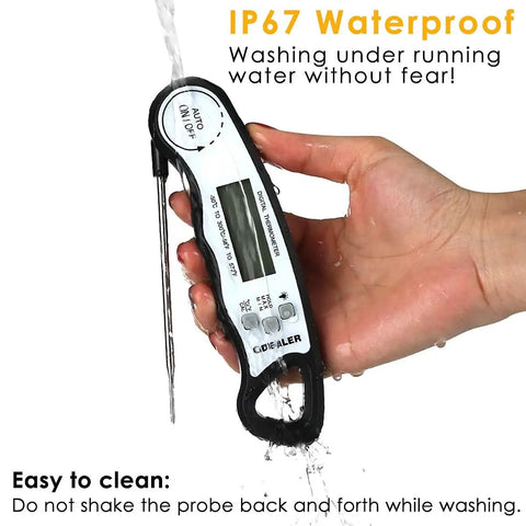 Hand holding Digital Instant Read Meat Thermometer with 4.6 inch folding probe under running water demonstrating IP67 waterproof feature