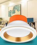 WKNHHL Recessed Lighting Housing Trim Kits Round Led Downlight Recessed Ultra Slim Chrome Aluminum Spotlight with orange trim.