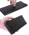 Two Pack Foldable Nursing Clipboard With 3 Layers And Medical Reference Cheat Sheets Lightweight Plastic Black Must Have Nurse Work Essentials For Shifts Portable Clipboard Set For On The Go shown folded in hand
