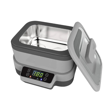 Top Shelf 1.2 Liter Ultrasonic Cleaner Featuring Slick Stainless Steel Tank And Easy Touch Controls, open with digital screen.