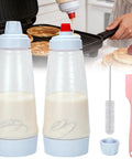 All In One Pancake Batter Dispenser With BlenderBall And Wire Whisk Includes Silicone Spatula And Cleaning Brush displayed on counter