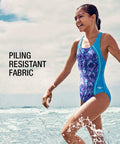 Girl wearing Girls One Piece Swimsuit With Thick Straps Racer Back Printed UPF 50 Plus Sun Protection in ocean