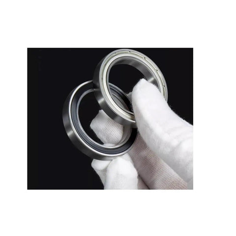 Premium P5 Precision Thin Section Ball Bearings Kit For High Speed Motors Offering Smooth As Butter Spin And Top Notch Durability Suj2 Steel Construction on display with sealed rings shown.