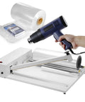 Heavy Duty Shrink Wrap Machine And Heat Sealer Film With Gun, Adjustable Temperature For Commercial Packaging in use with rolls.