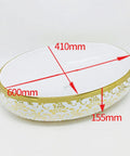 Real Deal Oval Vessel Sink, Solid Ceramic Bathroom Basin With Sleek Gold Finish, 600mm x 410mm size with floral design.