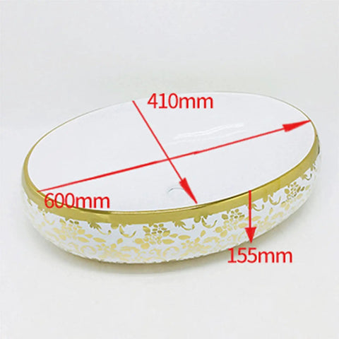 Real Deal Oval Vessel Sink, Solid Ceramic Bathroom Basin With Sleek Gold Finish, 600mm x 410mm size with floral design.