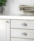 Modern kitchen with brushed nickel cabinet cup pulls 3 inch center hole 5 pack silver drawer handles and flower petal design.