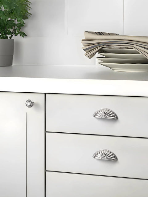 Modern kitchen with brushed nickel cabinet cup pulls 3 inch center hole 5 pack silver drawer handles and flower petal design.