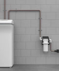 No Mess Whole Home Sediment Filter 30 Micron Replacement For No Mess System, mounted on a wall with piping system