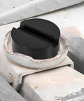 Tough As Nails Rubber Jack Pads Two Pack Universal Pinch Weld Savers on a floor jack for scratch-free vehicle lifting.