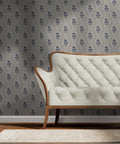 Kick Up Walls With Cottage Floral Blue And Silver Metallic Wallpaper Featuring Slick Fibrous Texture And Glamorous Shine Top Shelf Eco Friendly Made In Usa Pvc Free Paste The Wall Accent Decor With Fresh Indoor Vibes Daily behind a stylish tufted sofa.