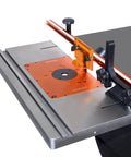 Dead Flat Cast Iron Router Table Extension Wing, 27 By 16 Inches, with precision gauge and secure clamps for stability.