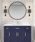 Two Pack Black Industrial Vanity Light Fixtures Over Mirror Sconces for Bathroom with Matte Black Finish beside round mirror.