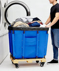 Top Shelf Heavy Duty Vinyl Basket Truck Glide Smooth Industrial Laundry Hamper Commercial Service Cart With Sturdy Wheels Blue Cover For Easy Hauling, filled with laundry.