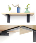 Wooden shelf mounted on wall with black brackets, featuring potted plants, demonstrating installation with screws for woodworking projects