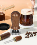 51mm Espresso Tamper Set With 30 Lb Consistent Pressure, Spring Loaded Calibrated Tamper, Silicone Mat, Coffee Stirrer And Distribution Tool, Wooden Barista Kit For Home Espresso Machines, Ideal For Your Italian Moment displayed on a countertop with coffee accessories.