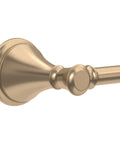 Close-up of Cassidy Collection Champagne Bronze Single Post Toilet Paper Holder Wall Mount, sleek modern design, easy install