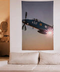 World War II Aircraft Wall Tapestry Large Polyester Print with sunset, hanging in modern living room above sofa