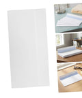 White 100 Pack Self Seal Envelopes With Peel And Seal Privacy Protection for letter size mail and legal shipping on desk.